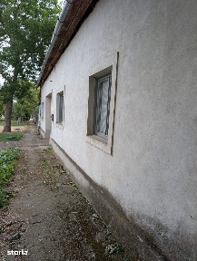 Vând casă + grădină la strada principala