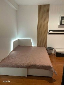 Garsoniera de inchiriat cu birou si bucatarie inchisa