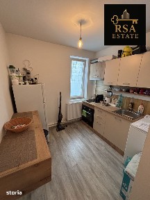 Garsoniera de vanzare etaj 1 zona Dovali Rm Valcea