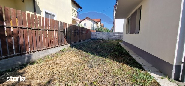 Apartament cu 2 camere, gradina si parcare de închiriat