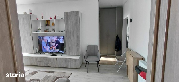 Garsoniera de vanzare noua si mobilata-demisol inalt