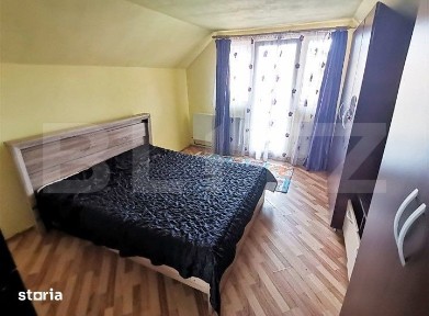 Casa cu 4 camere si curte cu 2 locuri de parcare, zona Iris