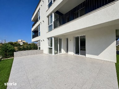 Apartament 42mp + terasa 40mp + curte 50mp + aproape de plaja
