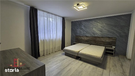 Casa 2 dormitoare, 60 mp, curte privata, 650m de UMFST