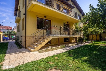 9 camere, 5 bai, spatiu hobby, gradina, garaj,locatie buna