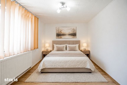 Apartament 3 camere cu curte proprie și garaj