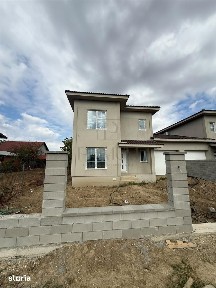 DUPLEX CU GARAJ, TEREN GENEROS ȘI 4 DORMITOARE