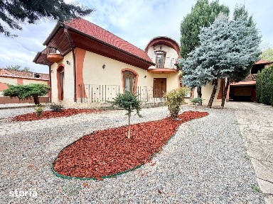 Casă P+M de vânzare garaj, terasă și curte amenajată teren 522mp Bujac