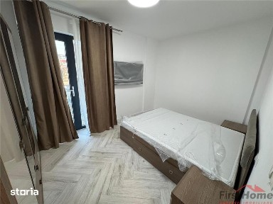 Ap 2 cam,parter,parcare, bloc nou, Scoala 2 - Piata Moldovei