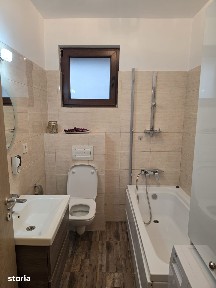 Vând studio cu o curte superbă,ceva deosebit.