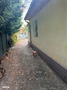 Casă cu 4 camere, zona centrală.