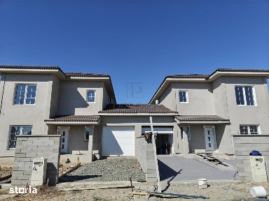 Duplex 5 camere - despartit prin garaj - teren generos