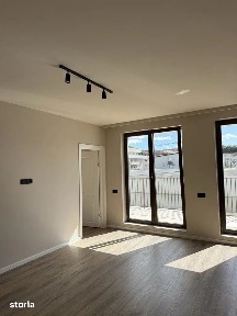 Apartament finisat cu terasa generoasa si parcare subterana Floresti