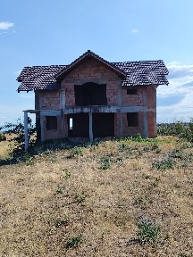 Casa de vanzare la rosu