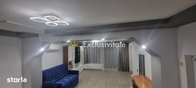 Casă P+M cu 1.558 mp teren, livadă și garaj