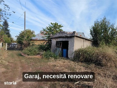CASA CU 4 CAMERE SI TEREN DE 1.000 MP IN BUTURUGENI,POSIBILITATE RATE