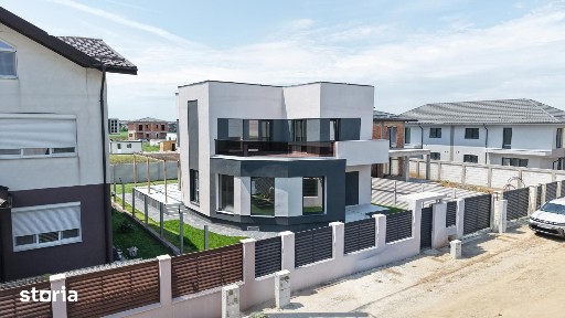 Casa moderna cu 4 dormitoare, terase generoase si teren de 430 mp