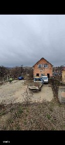 Teren cu clădire