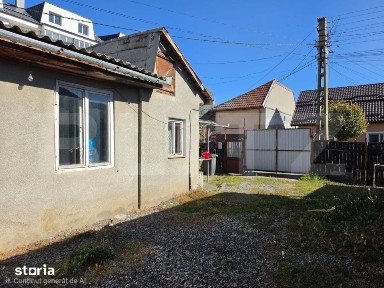 Casa 2 camere + garaj si dependinte - Teren 483mp - zona centrala