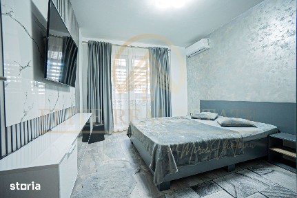 Apartament cu 3 camere, mobilat și cu parcare proprie