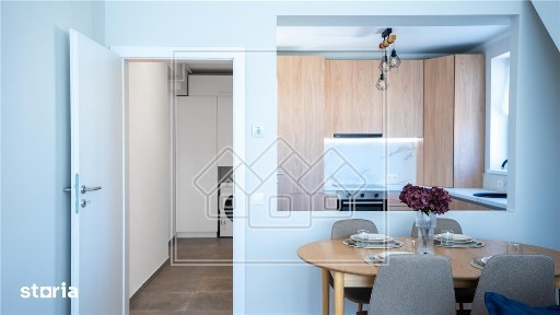Penthouse mobilat complet, intabulat, 3 camere si 2 bai