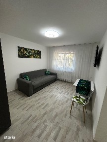 Închiriez garsonieră, modernă, călduroasă, zonă liniștită.