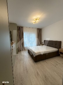 Apartament modern de 63 mp, cu 2 dormitoare si loc de parcare